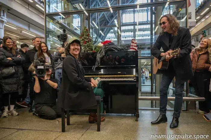 The Darkness Amazes Fans With Surprise Holiday Appearance at St Pancras Station