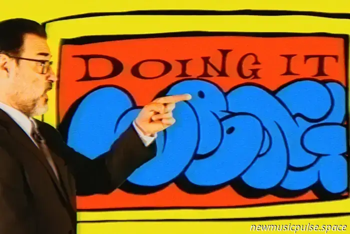 Adam Buxton taps into his inner David Byrne in the quirky 'Doing It Wrong' video.