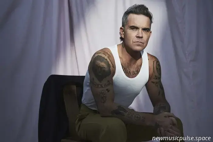 Robbie Williams anuncia nuevo álbum 'BRITPOP', comparte la primera canción'Rocket'